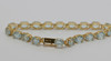 14K Yellow Gold Blue Topaz Bracelet app. 20 ct. tw., 7" Long