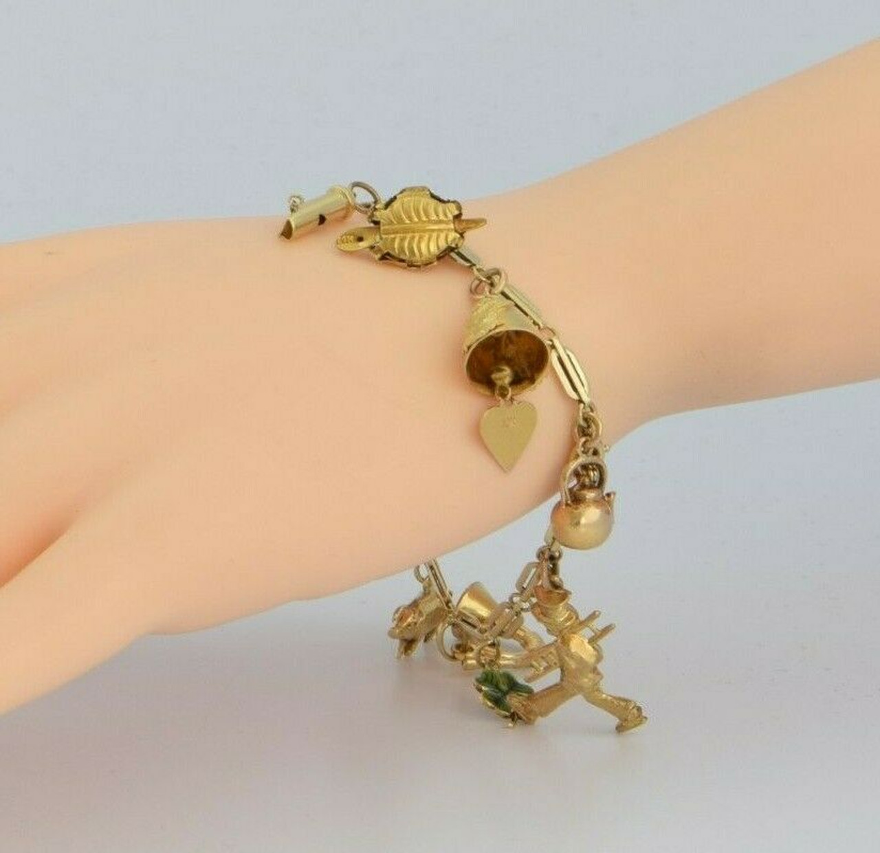 14 Karat Yellow Gold Charm Bracelet with 7 Cat Charms
