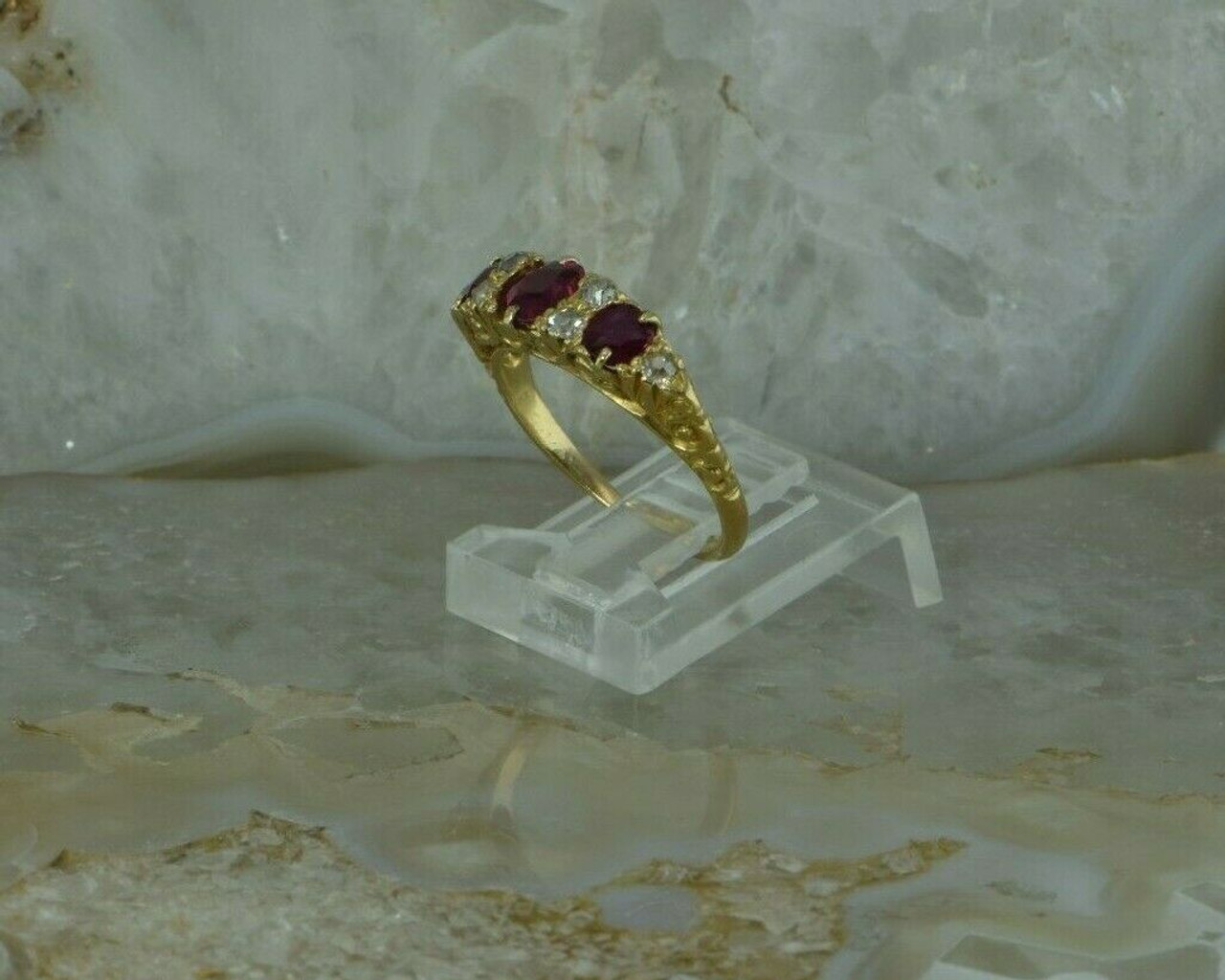 Oval Halo Prong Set Gold Ruby Ring with Diamonds
