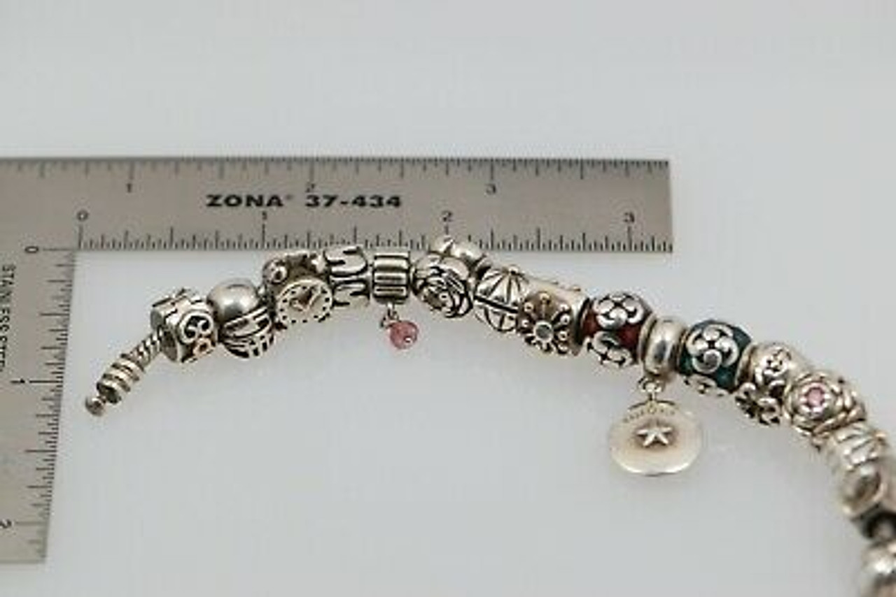 Sterling Silver Pandora Bracelet w/14K Yellow Gold Clasp & several Silver  Charms - Colonial Trading Company