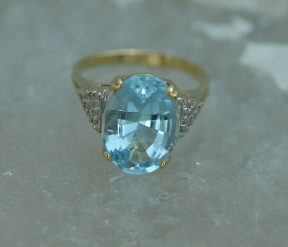 14K YG Blue Topaz Ring 7 ct. Large oval Stone Medium Blue 1970 Size 6.5