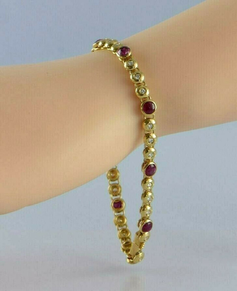 18K YG 5ct tw est. Ruby Cabochon and Diamond Bracelet 7.25" length Circa 1990