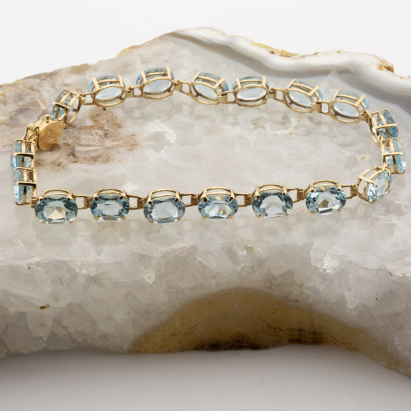 14K Yellow Gold 10ct tw Blue Topaz Oval Bracelet 7" length