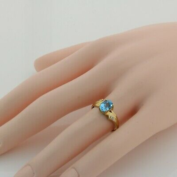 10K Yellow Gold Blue Topaz Diamond Accent Ring size 7