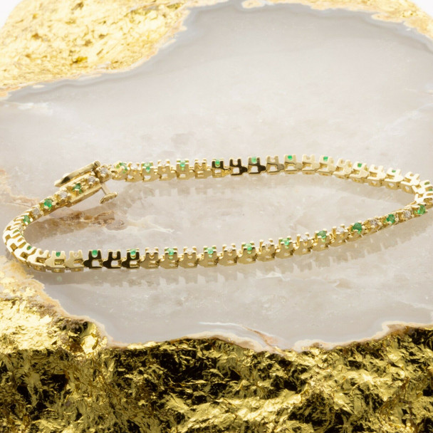 14K Yellow Gold 1.5ct Emerald and Diamond Tennis Bracelet Circa 1980