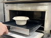Oven2Go® is a line of Patented ovenable packaging products for use in high-temperature cooking applications, such as rapid cook ovens, accelerated cook ovens, high-speed ovens, combination (combi) ovens, and microwave.  Oven2Go® containers are functional, customer-ready, highly engineered fiber bowls and trays that are designed to enable food to be prepared; placed in the container; cooked in an oven; and then handed to the customer without repacking or rehandling of the food.  This capability provides significant value in the form of packaging and labor cost savings.