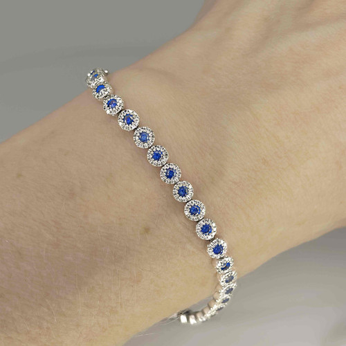 Unheated natural blue sapphire diamond halo tennis bracelet. Luxury sapphire tennis bracelet white gold. OPR Jewelry Jewellery. Buy antique and estate jewellery jewelry Sydney Australia. Sydney Antique Jewellery Shops Online Buy antique jewellery online Australia