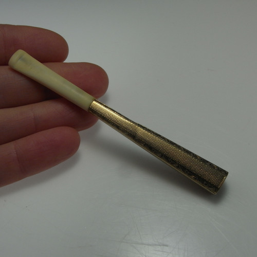 antique ivory and gold cigarette holder