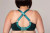 back view with straps crossed in Emerald Green.