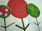 Picture of the stitch out below includes:
#1 satin stitch applique retro tree on left
#2 raw edge applique retro tree on the right
#3 fancy fill retro tree from our #466 Retro Tree set [non-applique and not included in this set]