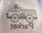 After application - nicely protected/covered stitches on the back of a t-shirt - very silky, smooth texture for infant and toddlers skin.