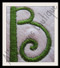 Close-up of 1.7" Side Letter "B" stitched out from our No 1344 Swirly 3 Letter Monogram Machine Embroidery Designs 3 inch and 1.7 inch high
