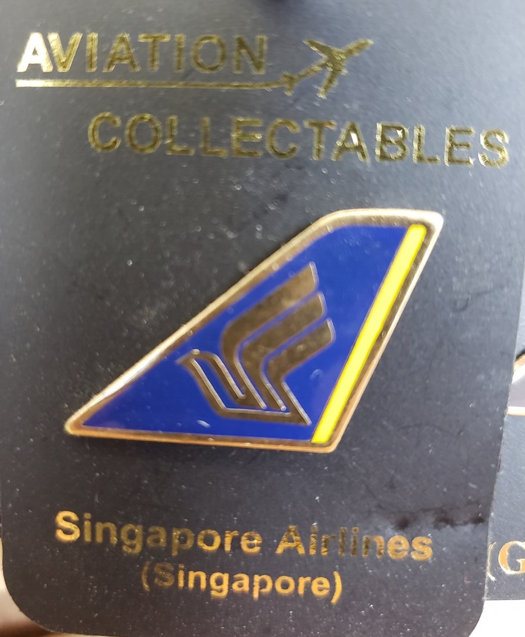 Lapel pin - Singapore Airlines tail