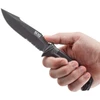SOGSS1003CP 9 5/8" overall. 4 7/8" AUS-8 stainless partially serrated blade with black TiNi finish. Full, extended tang with strike end. Textured black glass reinforced nylon handles with black finish stainless inlay trim. Deluxe edition black hard molded nylon belt sheath with integrated line cutter with cover, built-in sharpener, and built-in ferrochromium firestarter rod.