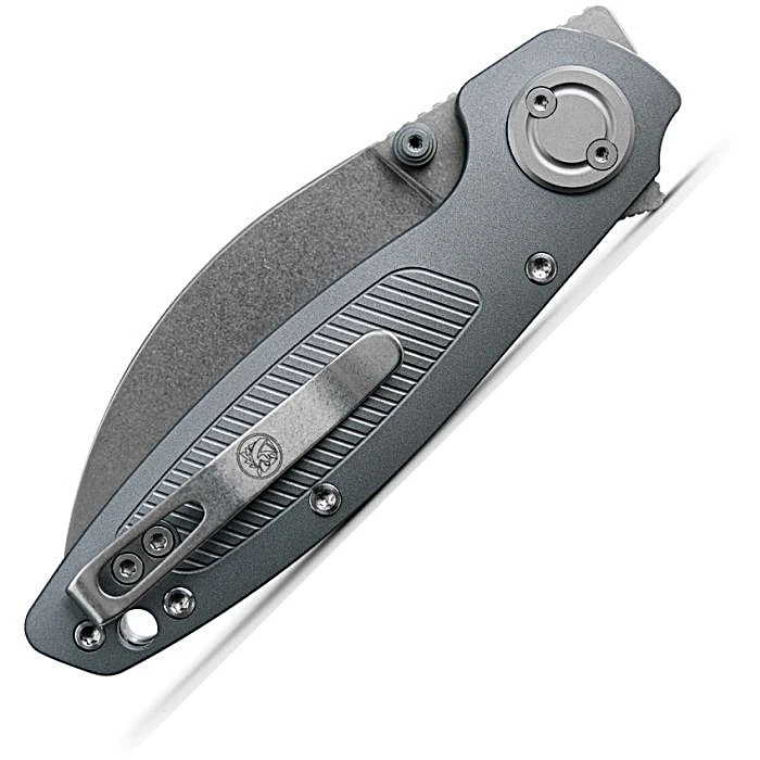 VOSA2807 4.13" (10.49cm) closed. 2.9" (7.37cm) stonewash finish Elmax steel blade. Gray aluminum handle. Thumb stud. Lanyard hole. Pocket clip. Extended tang. Left hand version. Black nylon zippered storage case.