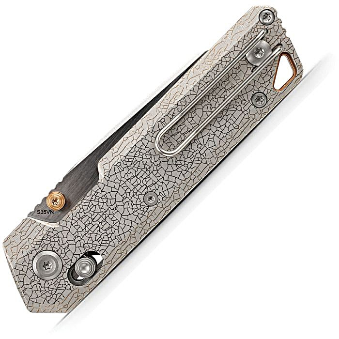 VOSA3509 4.13" (10.49cm) closed. 2.9" (7.37cm) S35VN stainless reverse tanto blade. Arctic Crackle titanium handle. Thumb stud. Lanyard hole. Pocket clip. Satin and brushed finish blade. Black nylon zippered storage case.
