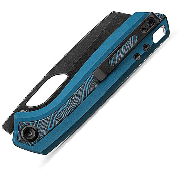 VOSA1811 4.38" (11.13cm) closed. 3.25" (8.26cm) black stonewash finish flat ground S35VN stainless sheepsfoot blade. Blue aluminum handle with Topo G10 inlay. Thumb pull. Lanyard hole. Pocket clip. Black nylon zippered storage case.