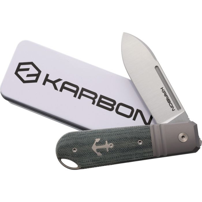 KARB103 4.13" (10.49cm) closed. 3.13" (7.95cm) satin finish Bohler M390 stainless spear point blade. With Denim micarta inlay. Extended tang. Lanyard hole. Inlay shield. Pocket clip. Gray titanium frame with integral shield. Made by Reate. Designed by Ken Onion.