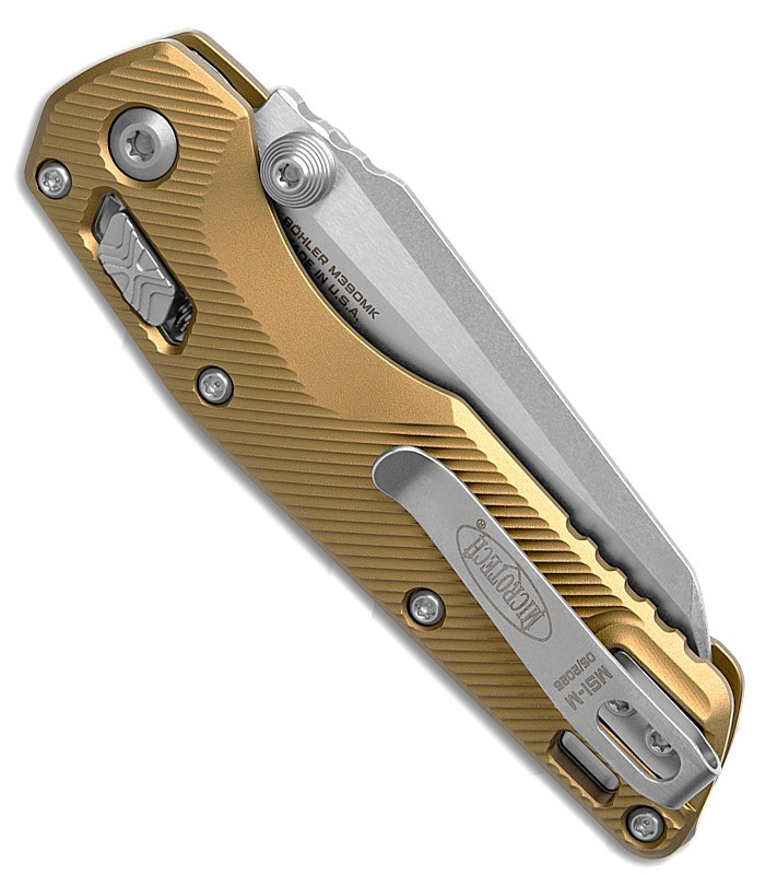 MCT210M10FLTA 4.25" (10.8cm) closed. 3.25" (8.26cm) stonewash finish Bohler M390MK stainless sheepsfoot blade. Tan fluted aluminum handle. Pocket clip. Lanyard hole. Thumb stud.