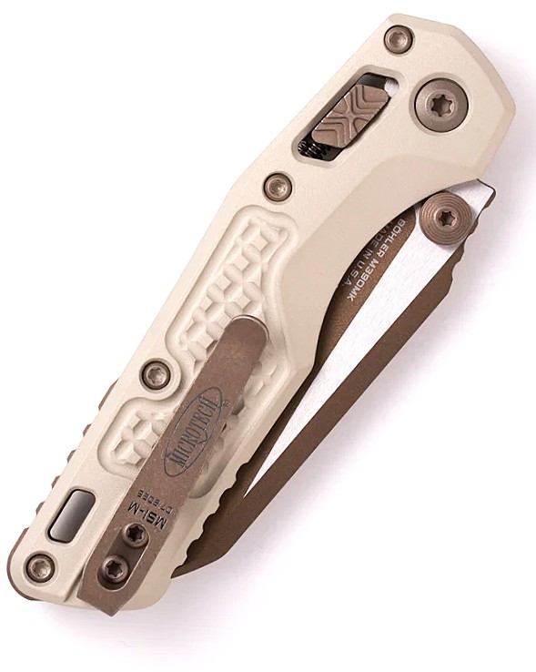 MCT210M1FRCGC19Z23 4.25" (10.8cm) closed. 3.25" (8.26cm) two-tone finish Bohler M390MK stainless sheepsfoot blade. Champagne frag pattern aluminum handle. Pocket clip. Lanyard hole. Thumb stud.