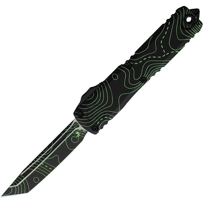 MCT112341TPBKPG Automatic opening. 5" (12.7cm) closed. 3.5" (8.89cm) Bohler M390MK stainless tanto blade. Aluminum handle. Pocket clip. Lanyard hole. Glass breaker. Topographic black and parakeet green camo blade and handle.