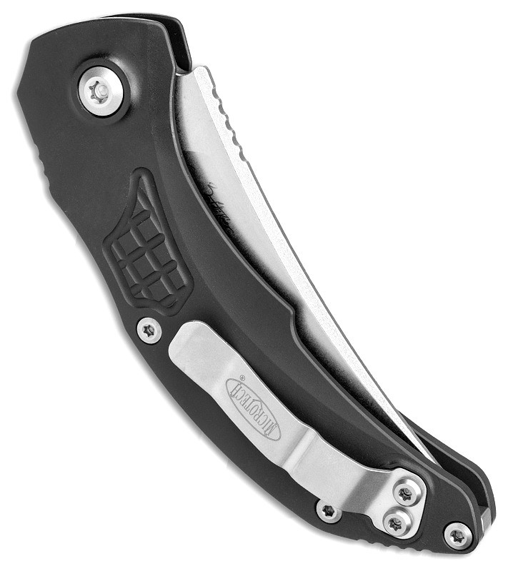 MCT268A10 Automatic opening. 4.75" (12.07cm) closed. 3.5" (8.89cm) stonewash finish Bohler M390 stainless curved blade. Black textured aluminum handle. Pocket clip. Collaboration with Bastinelli Knives.