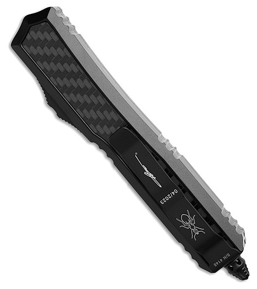 MCT2063TCFIS Automatic opening. 5.13" (13.03cm) closed. 3.38" (8.59cm) black Cerakote finish serrated stainless dagger blade. Black anodized aluminum handle with carbon fiber inlay. Glass breaker. Lanyard hole. Pocket clip. Double edge blade. Nickel Boron internals. Signature Series.