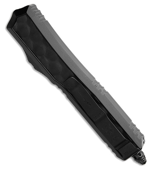 MCT2061TBIS Automatic opening. 5.13" (13.03cm) closed. 3.38" (8.59cm) black Cerakote finish double edge stainless dagger blade. Black anodized aluminum handle with black bubble aluminum insert. Glass breaker. Lanyard hole. Pocket clip. Nickel Boron internals. Signature Series.