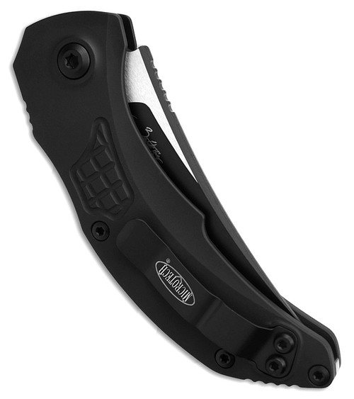 MCT268A1T Automatic opening. 4.75" (12.07cm) closed. 3.5" (8.89cm) black Cerakote finish Bohler M390 stainless curved blade. Black textured aluminum handle. Pocket clip.