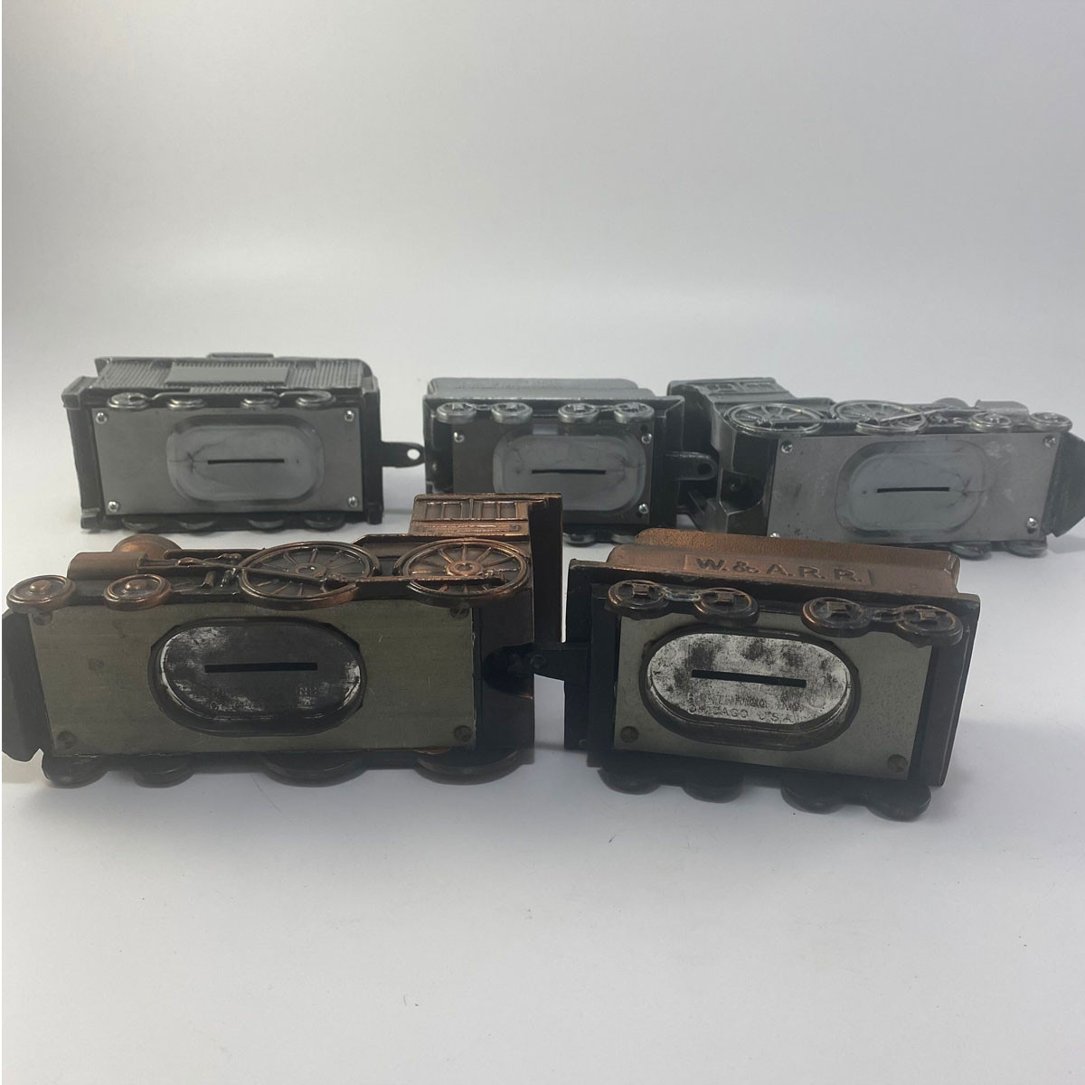 Two Antique Locomotive Bank Train sets display picture 1