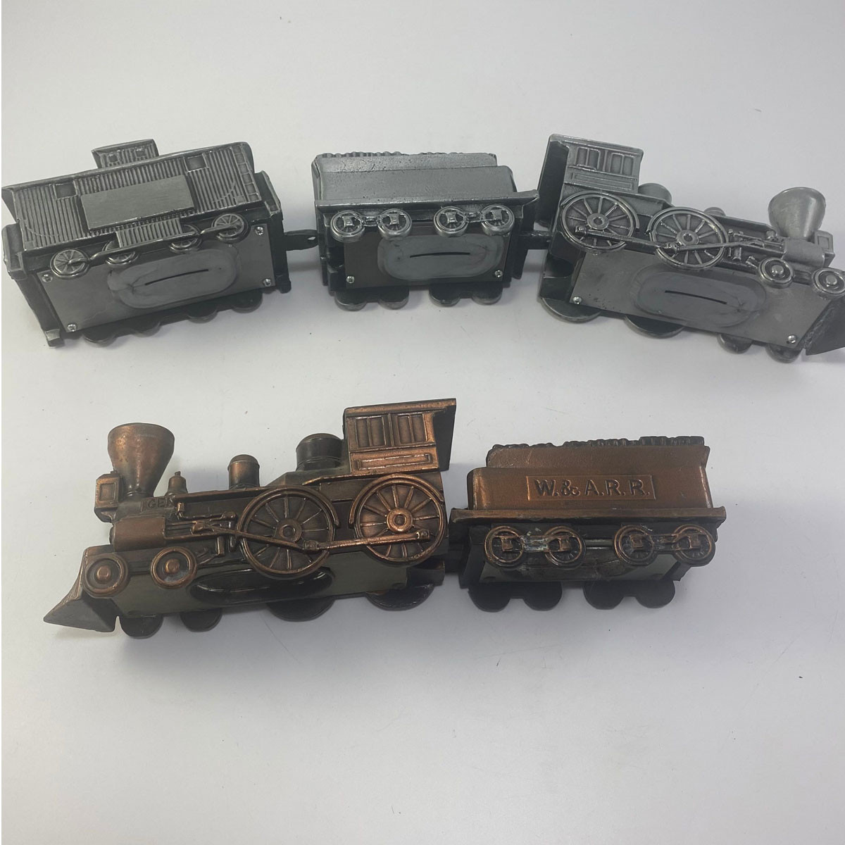 Two Antique Locomotive Bank Train sets display picture 1