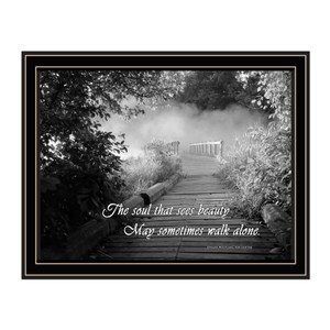 "Beauty" in a black grooved frame