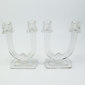 Heisey Glass Candleholders by the A.H. Heisey & Company, was a prominent American glassware manufacturer that operated from 1896 to 1957 Heisey Glass Candleholders by the A.H. Heisey & Company, was a prominent American glassware manufacturer that operated from 1896 to 1957