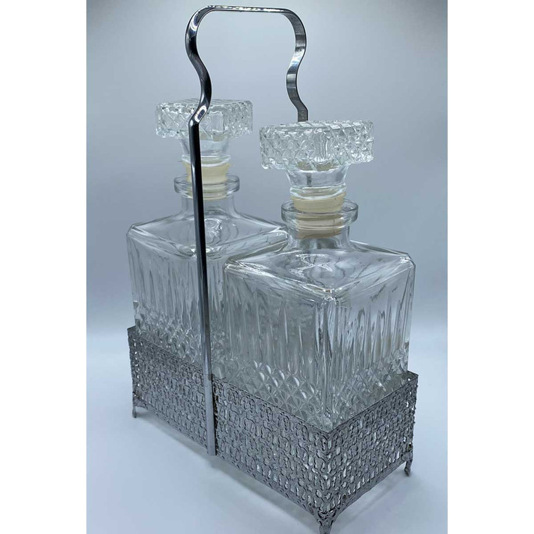 Vintage French pressed glass set includes (2) whiskey decanters in a metal tray