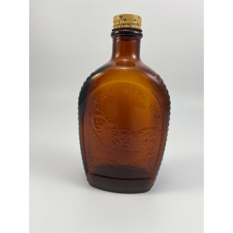 Log  Cabin Mt Rushmore deep amber bottle Image:© Modern2Historic