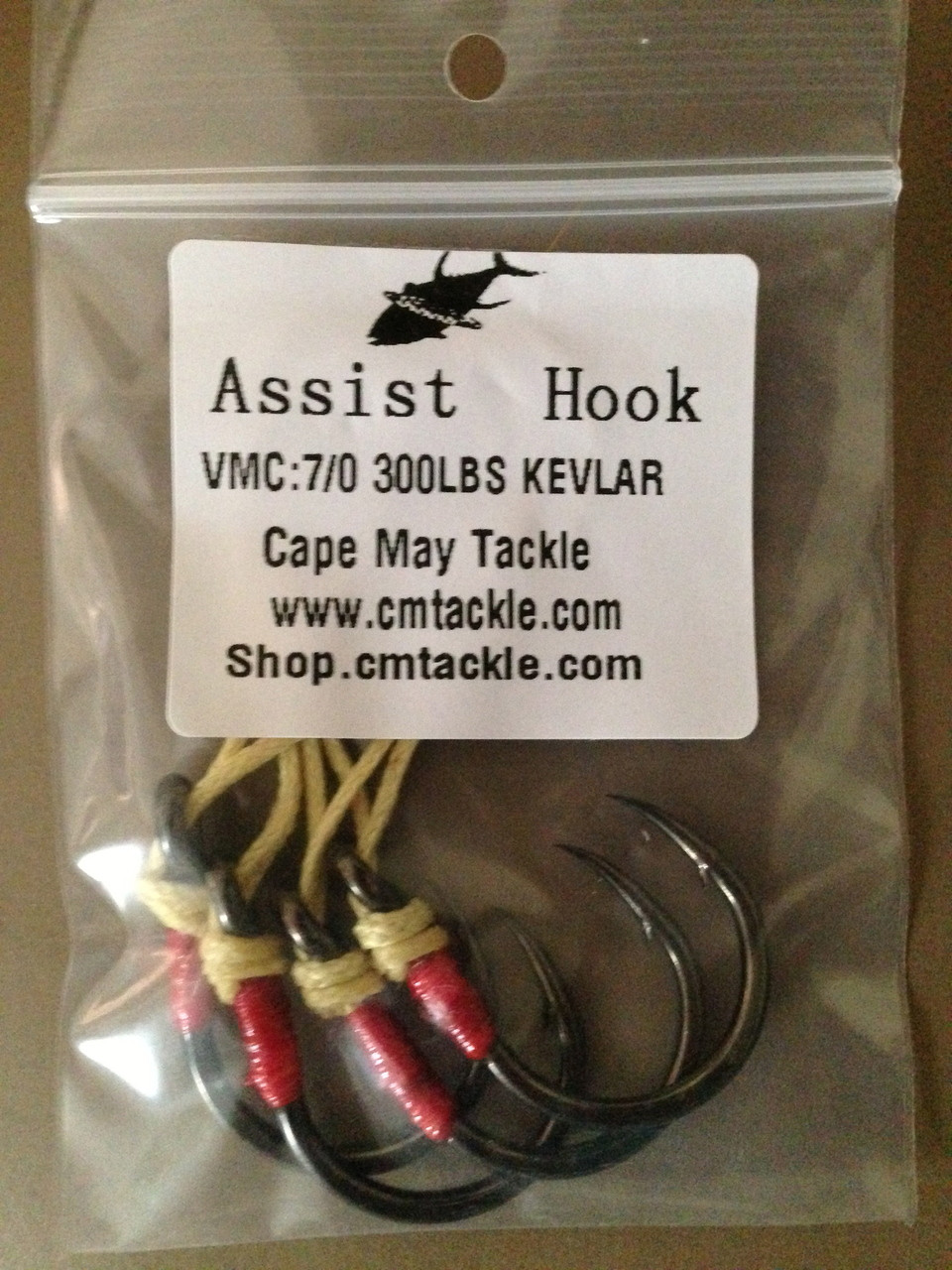 Hand served VMC 7/0 Assist hooks on USA made Kevlar Cord, 4 pcs per package.