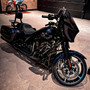 Black Backbone 25-inch sissy bar installed on a Harley-Davidson Street Glide, side view
