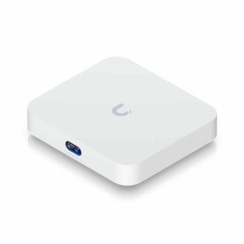Top-down view of Ubiquiti UCG-ULTRA highlighting its compact, square design with a white polycarbonate enclosure