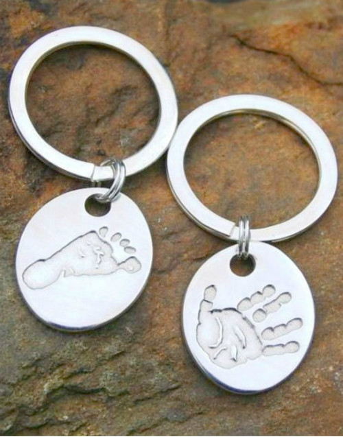 Sterling silver single print hand or foot print oval keyring and sterling silver split ring