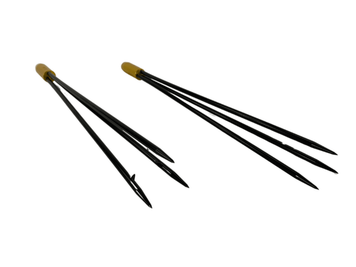 Pole spear tips with 3-prong paralyzer design, one barbed and one smooth variant, black shafts with brass collars angled view