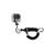 Silver and black action camera mounted on black coiled lanyard with wrist strap attachment, displayed at angle against white background