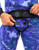 Men's Yamamoto Ocean Blue 3D Camo 2-Piece Open Cell Wetsuit with weight belt system being adjusted at waist
