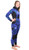Woman wearing blue ocean camo and black Yamamoto 3D open cell wetsuit, full-length side view