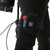 Ocean Guardian Shark Shield attached to black wetsuit leg, showing red and blue controls, side angle view