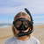 MAKO kids freedive mask with black frame and snorkel worn by child on beach with ocean background