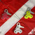 MAKO freedive rope pulleys in red, white, and yellow arranged on red and white fabric background