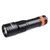 Black and orange 1700 lumens dive light with textured grip and LED head, angled right on white background