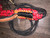 Insidious Red Brazilian Hybrid Pro Bull Rope Block Close up