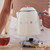 SMEG - Mini Bollitore 50's Style – Panna LUCIDO – KLF05CREU - 2210006133 SMEG 5 | Trony.it