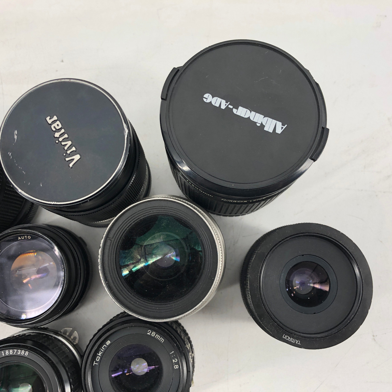 ASSORTED MF 11 LENSES FROM VIVATAR, MINOLTA, PENTAX AND MORE